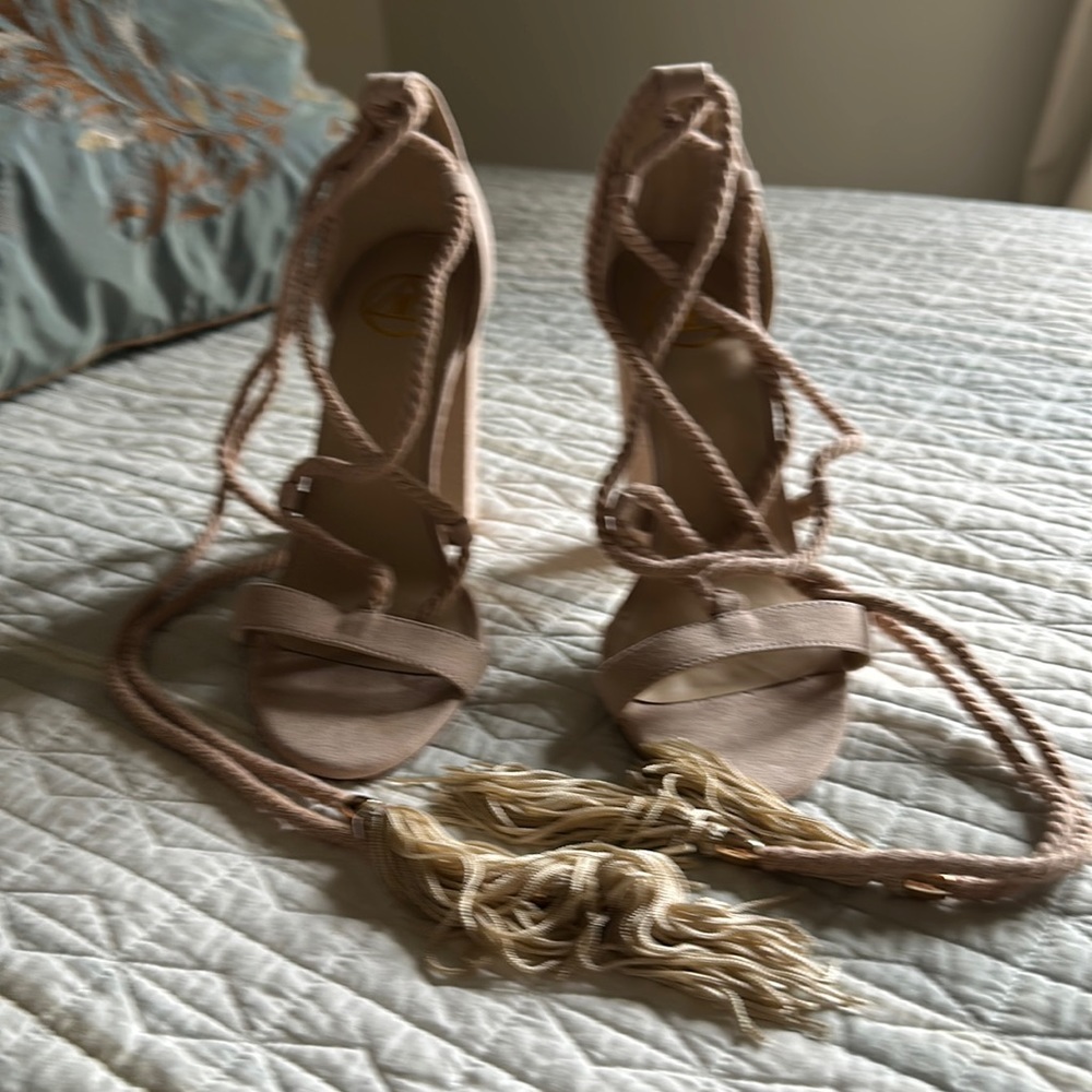 Suede sandals with rope tie and tassels